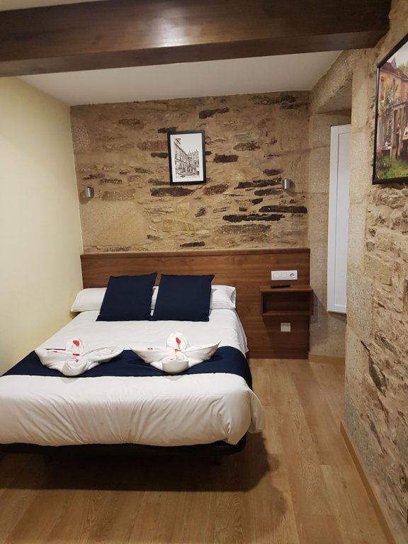 Фото Oxford Suites Santiago de Compostela