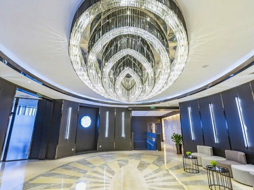 Внешний вид отеля Novotel Zhengzhou Convention Centre Hotel в Чжэнчжоу, фото 3