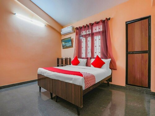 Гостиница Oyo 37494 Ma Micky Guest House в Бенаулиме