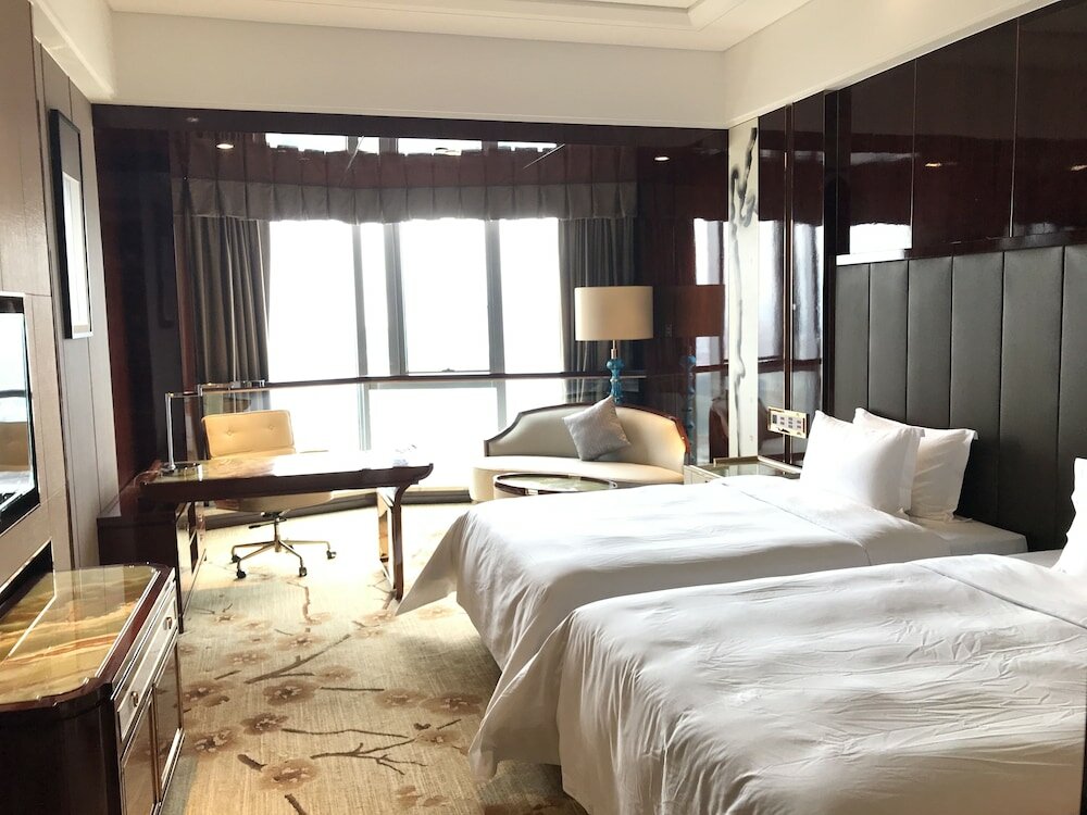 Фото Guangzhou Estandon Hotel