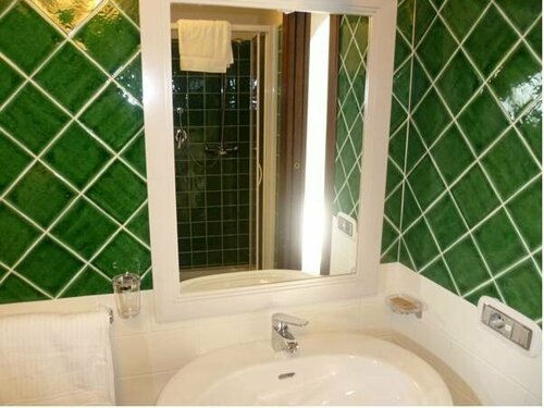 Гостиница Albergo Residenziale La Corte в Тортоли
