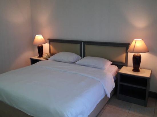 Фото Garden Paradise Hotel & Serviced Apartment