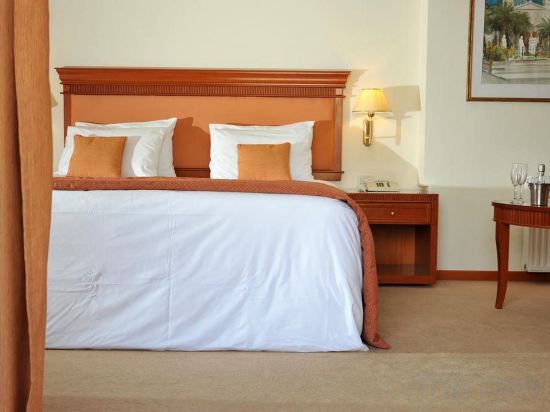 Фото Athens Atrium Hotel and Suites