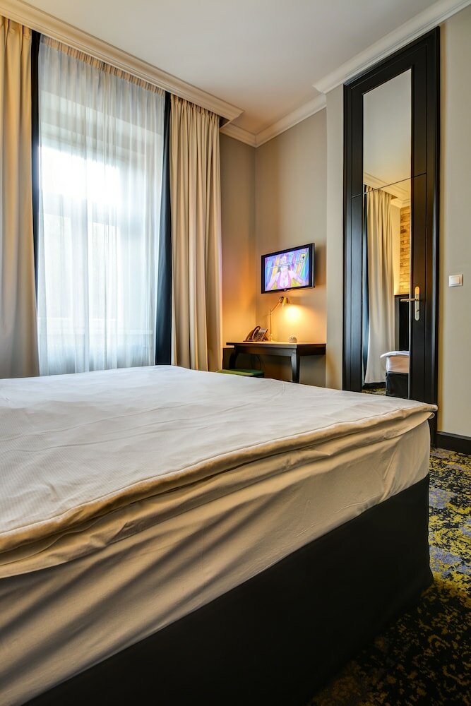 Фото Numa Root Rooms & Apartments
