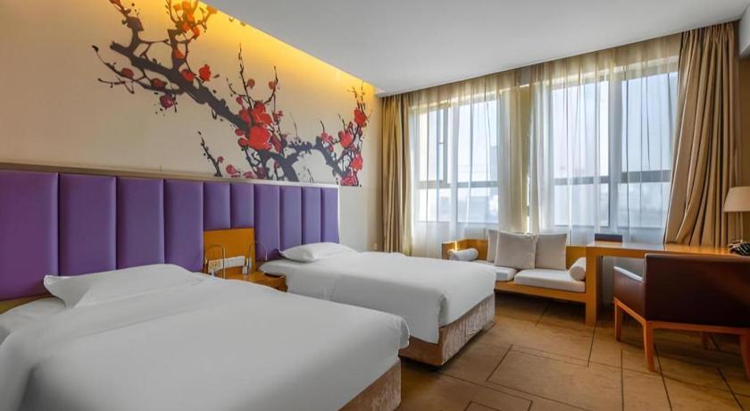 Фото Metropolo Wuhan Wanda Mansion