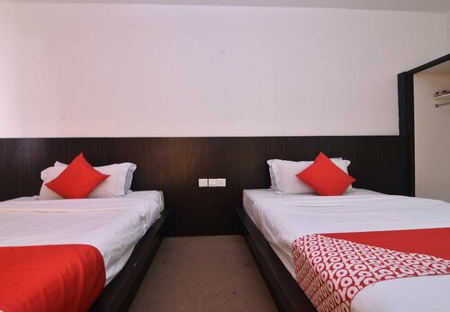 Гостиница Oyo 43960 Laksamana Executive & Boutique Hotel в Тавау