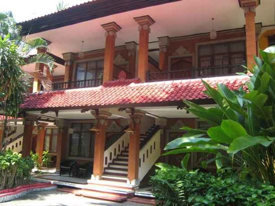 Фото Puri Naga Beachfront Cottages