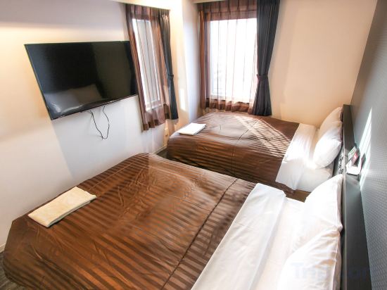 Фото Hotel Livemax Osaka Kadoma
