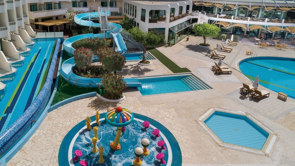 Фото Constantinou Bros Athena Beach Hotel