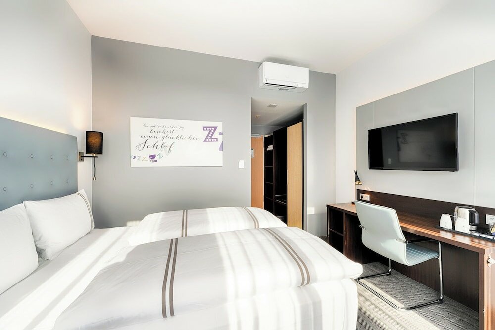 Фото Acom-Hotel Munich