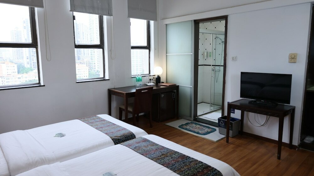 Фото Guangzhou Aiqun Hotel