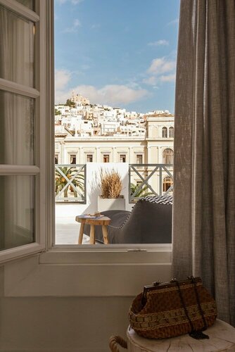 Гостиница Syros Soul Suites в Эрмуполисе