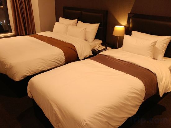 Фото Gangneung Tourist Hotel