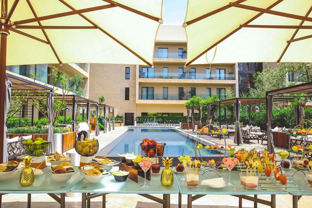 Фото Radisson Blu Hotel, Marrakech Carre Eden