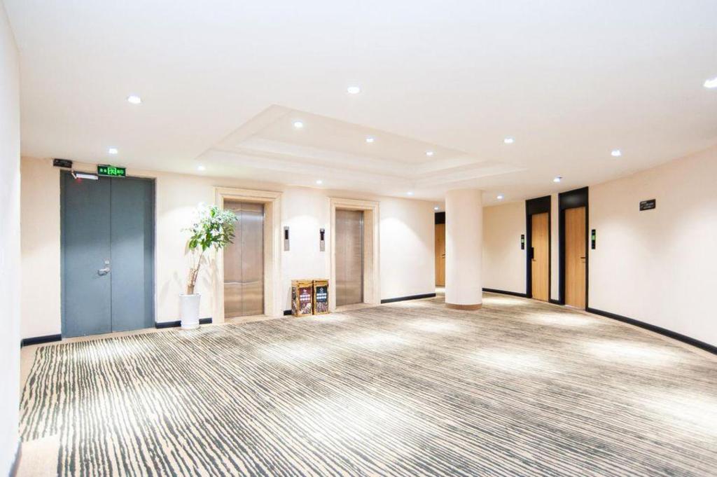 Фото GreenTree Inn Shanghai Jiading Anting Motor City Express Hotel