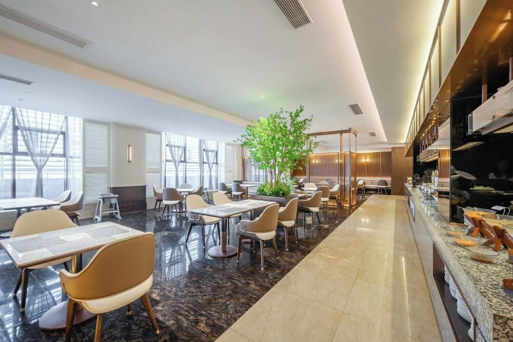 Фото Shanghai Maixinge International Hotel