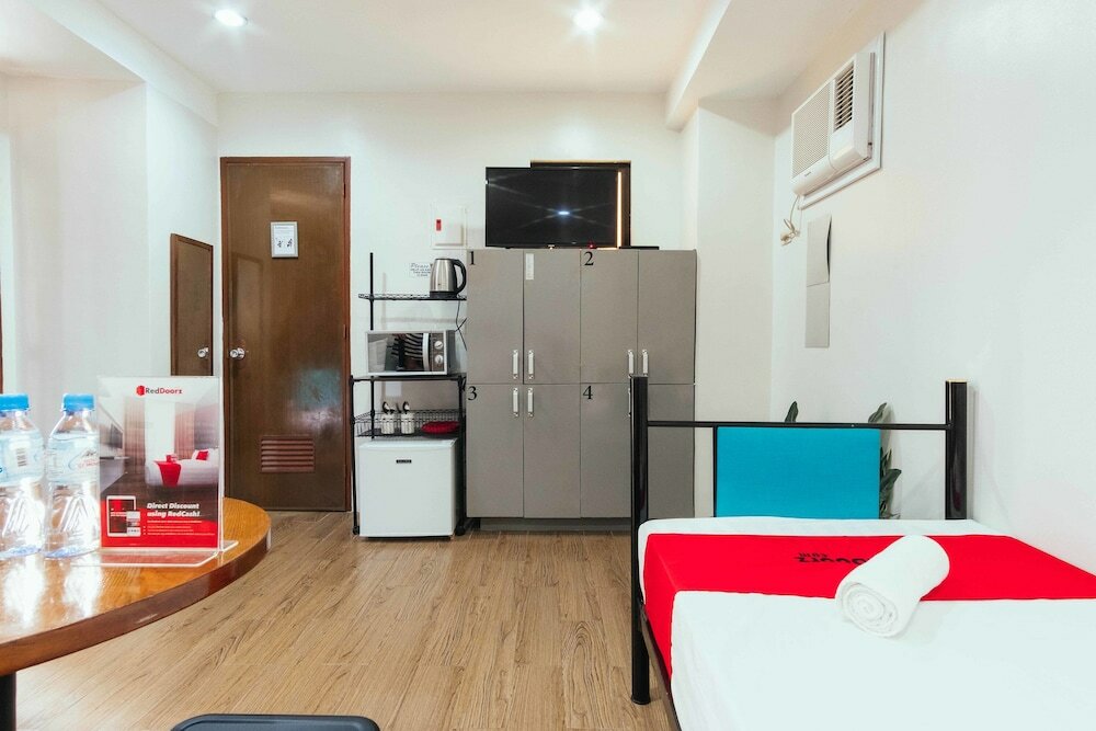 Фото Oyo 443 Maria Cristina Arcade Suites