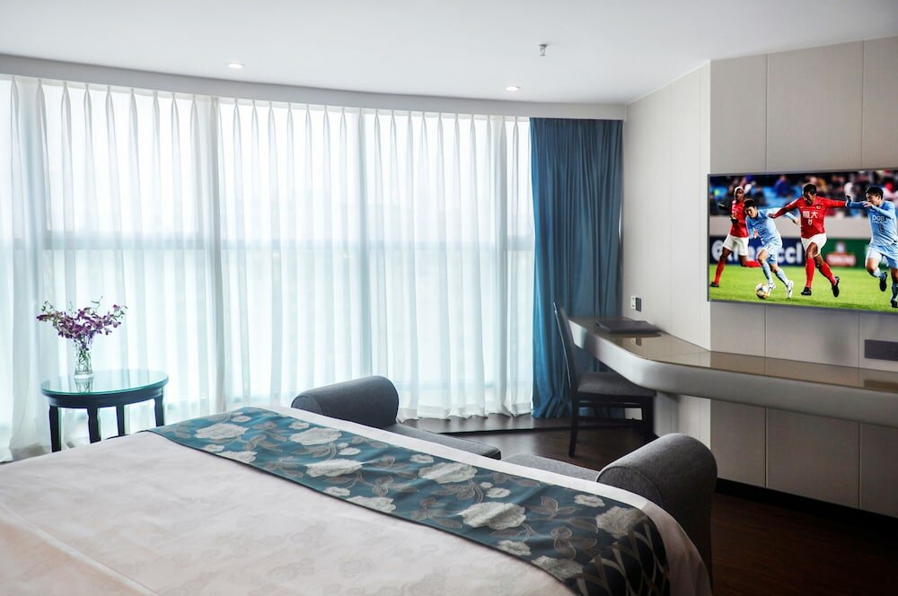 Фото Xiamen Hooray Hotel