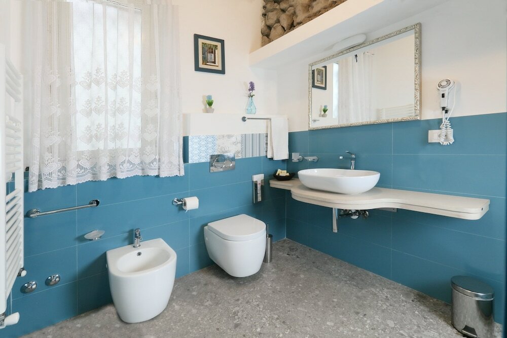 Фото Porta Di Mezzo Luxury B&b