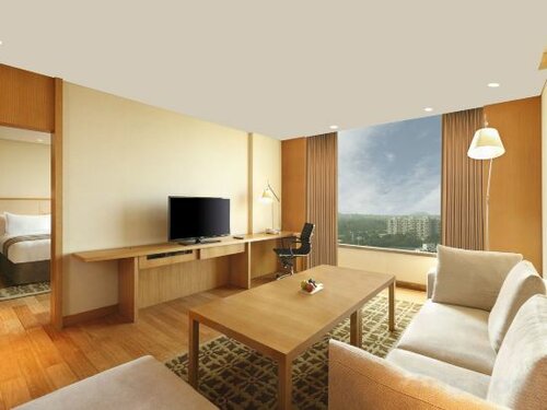 Внешний вид отеля DoubleTree by Hilton Hotel Pune - Chinchwad в Хавелях, фото 3