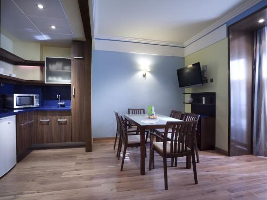 Фото Suites Gran VIA 44 Apartahotel