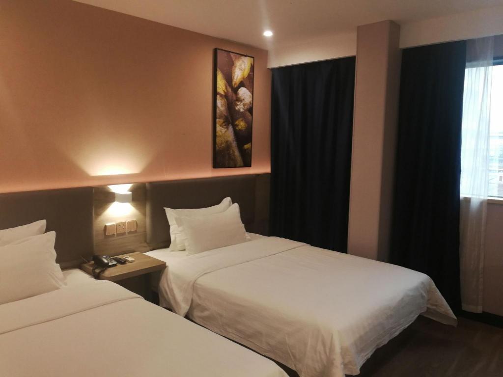 Фото 7 Days Inn Shanghai South Hongmei Road Branch