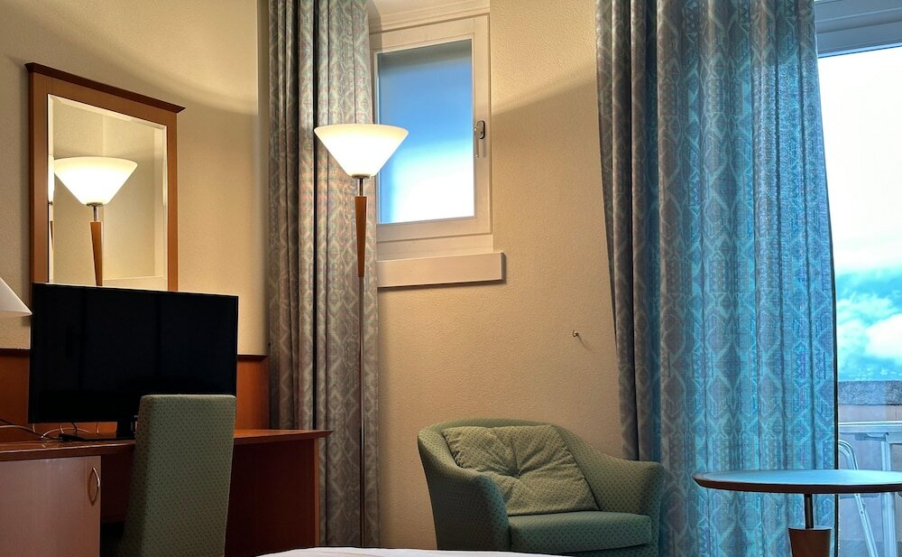 Фото E-Rooms Minusio