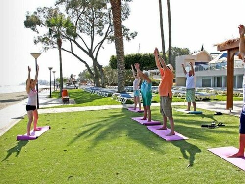 Внешний вид отеля Poseidonia Beach Hotel в Агийосе Тихонасе, фото 5