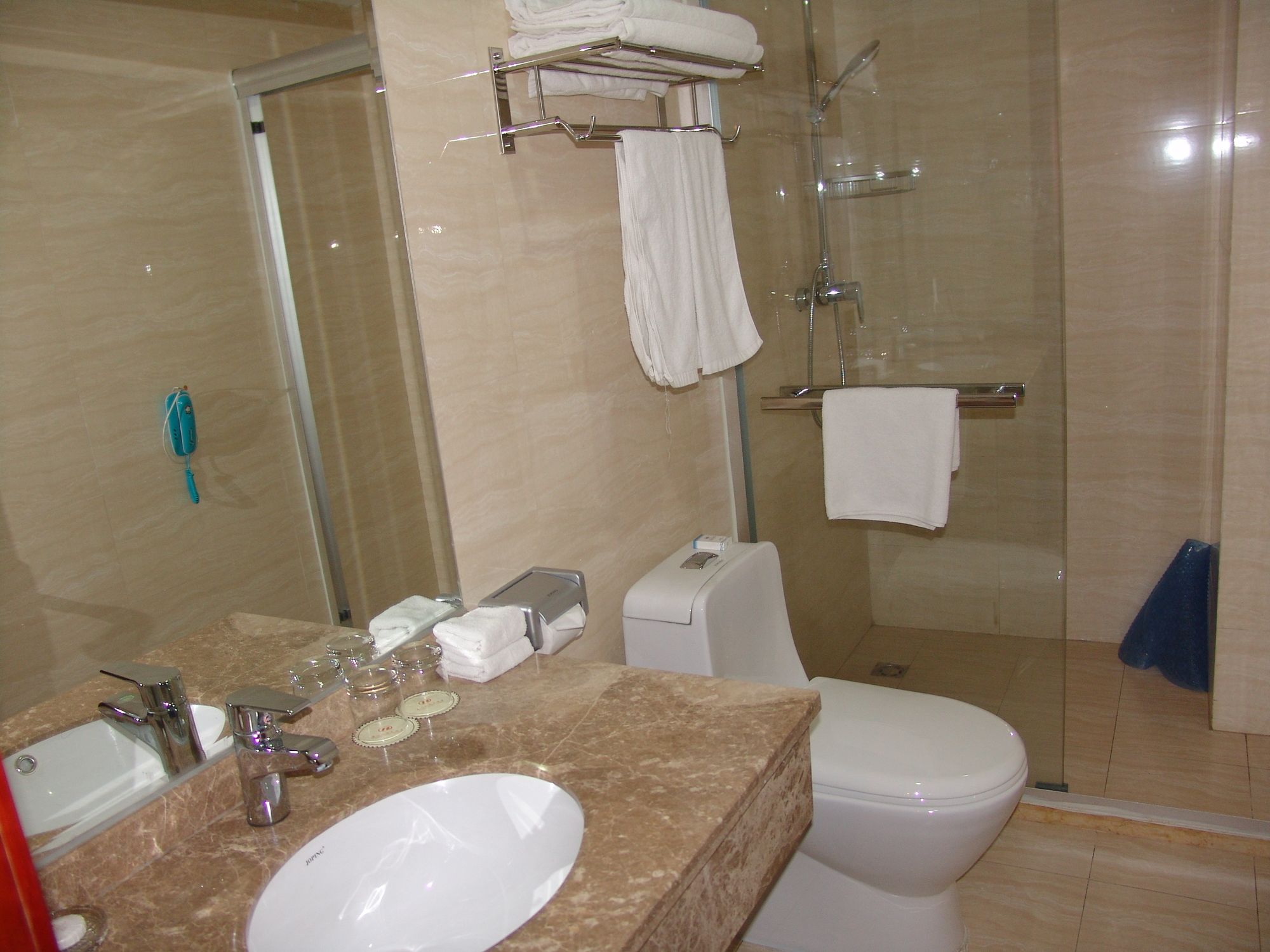 Фото Xiamen Hooray Hotel