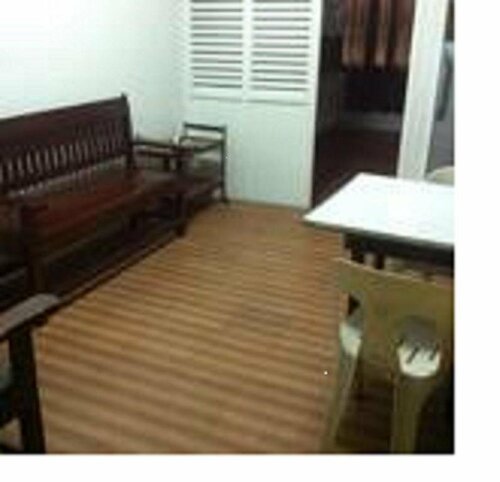 Гостиница Casa Blanca Apartment в Маниле