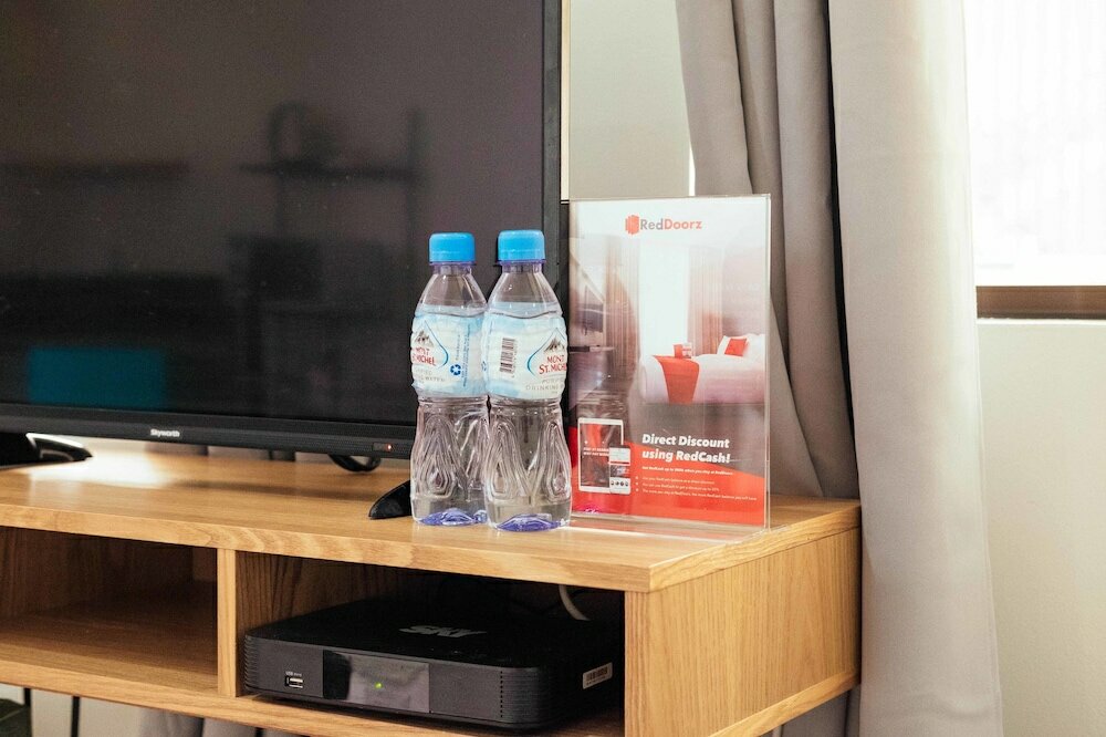 Фото Oyo 443 Maria Cristina Arcade Suites