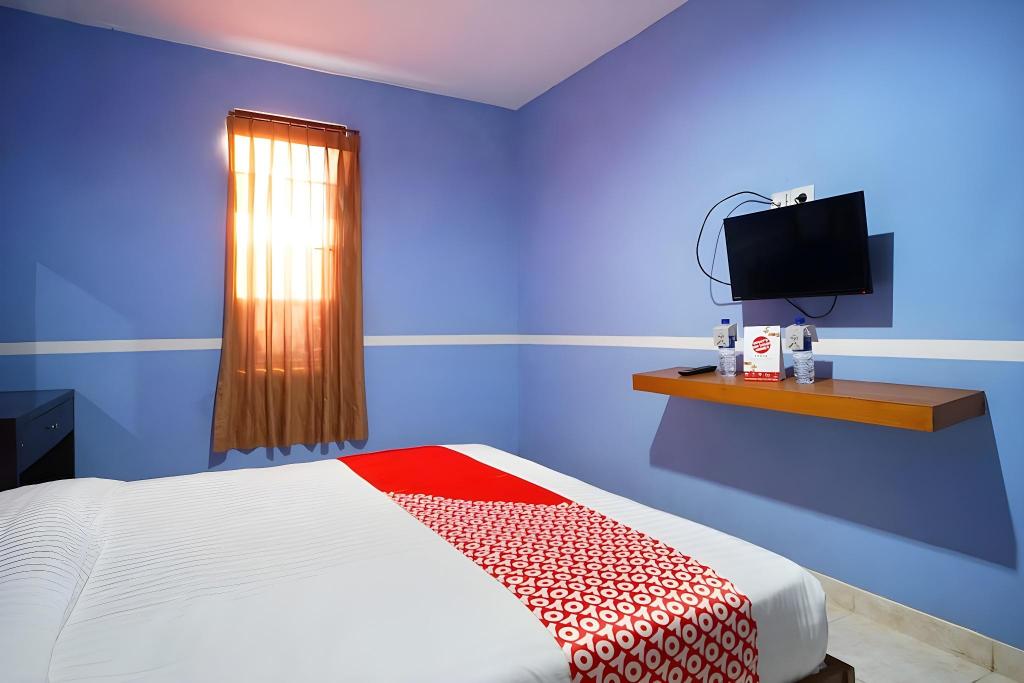 Фото Oyo 1272 Grand Garuda Guest House