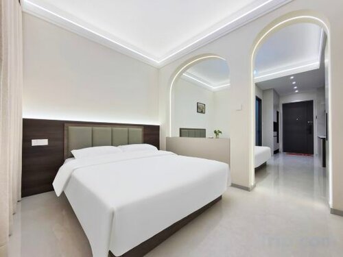 Гостиница Ledou Apartment в Харбине