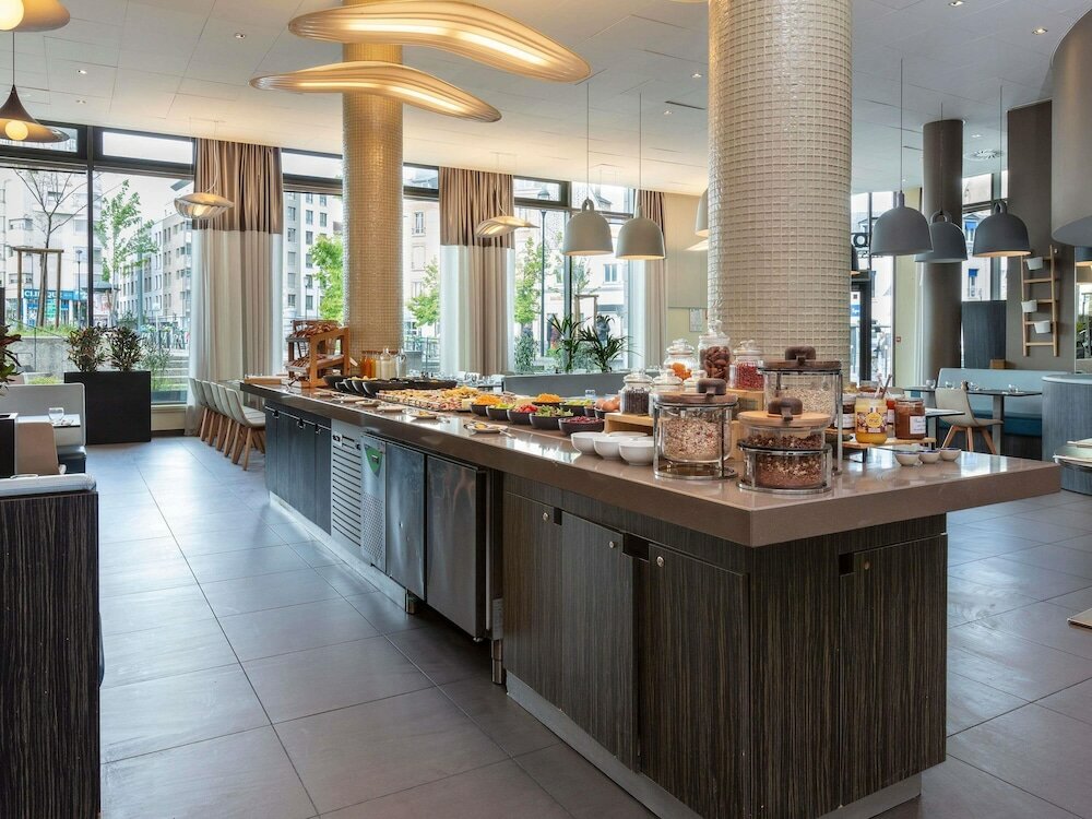 Фото Novotel Paris Saint Denis Stade Basilique