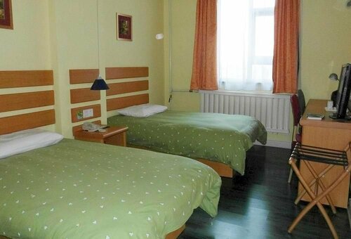 Гостиница Home Inn Hotel в Цзямусы