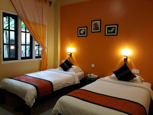 Гостиница The Villager Lodge в Сандоуэе