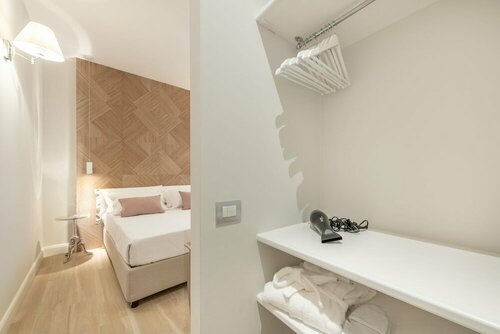 Гостиница Aquamadre Suites в Карлофорте