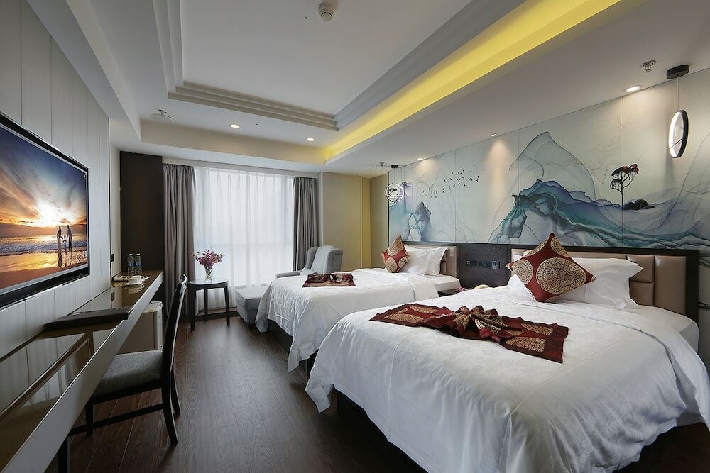 Фото Xiamen Hooray Hotel