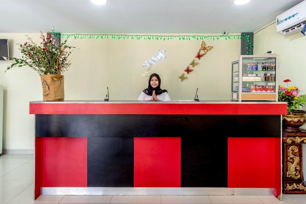 Фото Oyo 283 Helvetia Residence