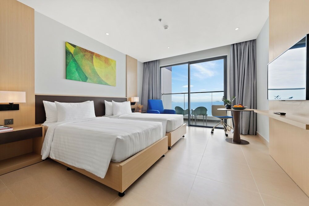 Фото The Empyrean Cam Ranh Beach Resort