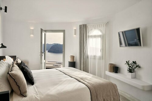 Внешний вид отеля Charisma Suites в Муниципальной единице Оиасе, фото 1