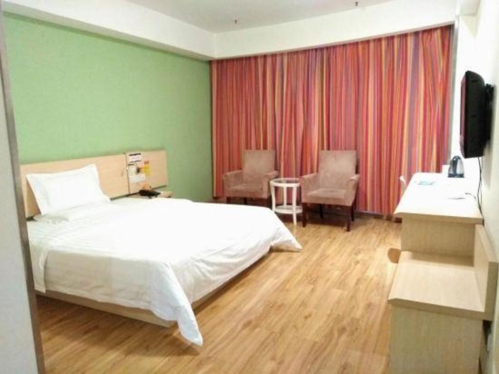 Фото 7Days Inn Chain Hotel Chongqing Wanzhou Gaosuntang Chongbai