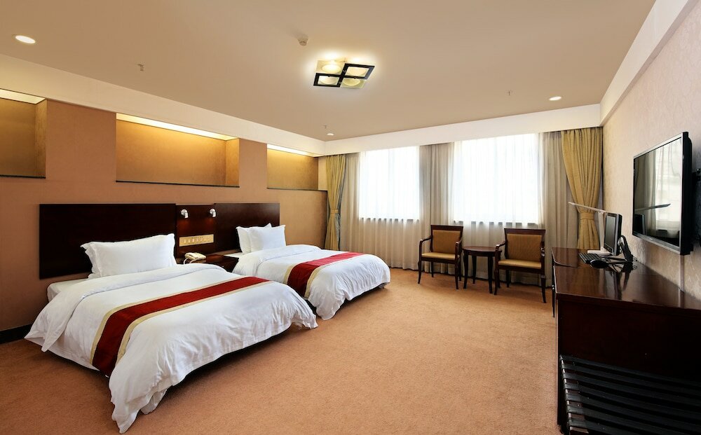 Фото Xin Hua Hotel Guangzhou
