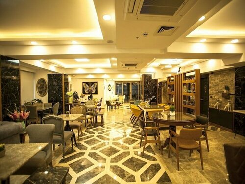 Гостиница Lion Park Suites & Residence Hotel в Айдыне