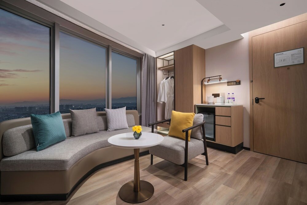 Фото Yimei Plaza Hotel