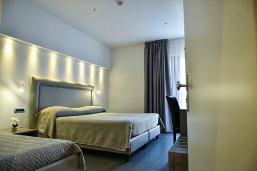 Гостиница Pompei Inn Ruins Luxury Suites в Помпеи
