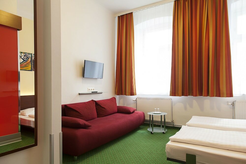 Фото Pension Stadthalle