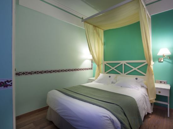 Фото Suites Gran VIA 44 Apartahotel