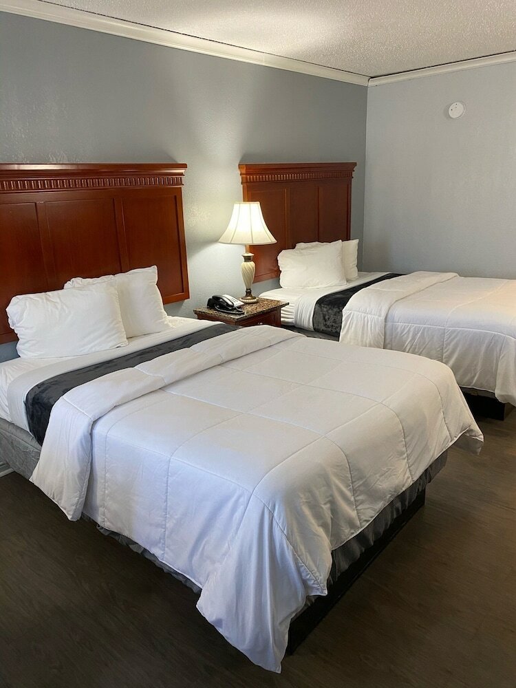 Фото Quarters Inn & Suites