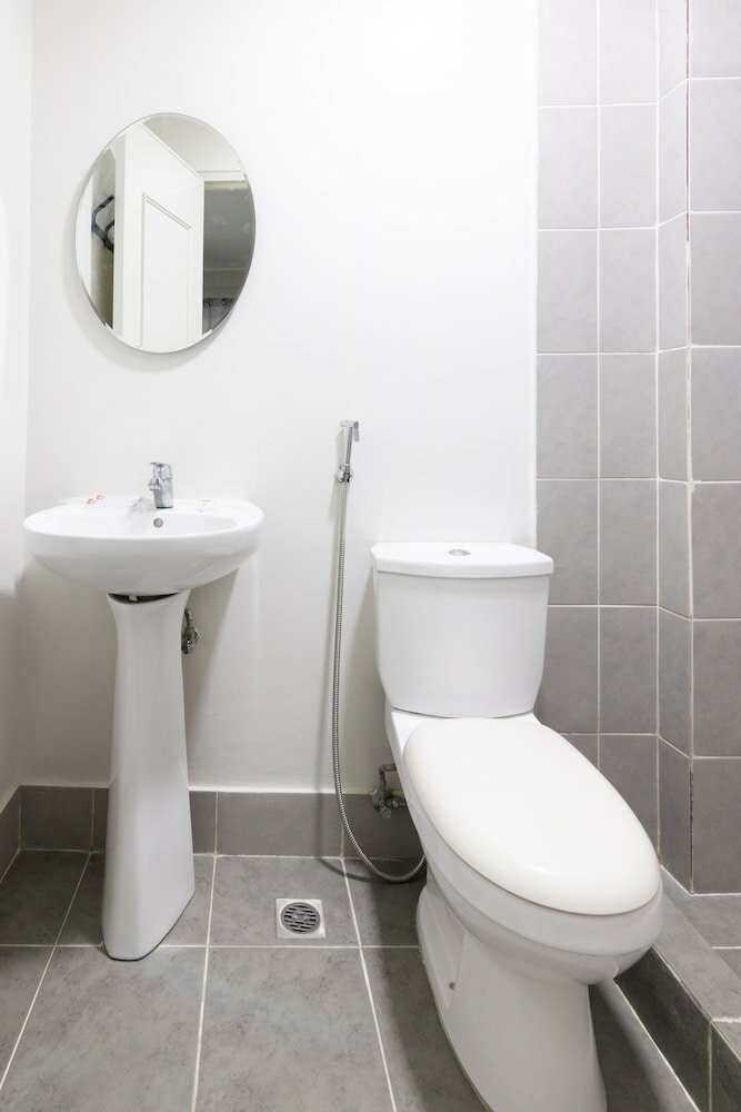 Фото Oyo 152 Sangco Condotel